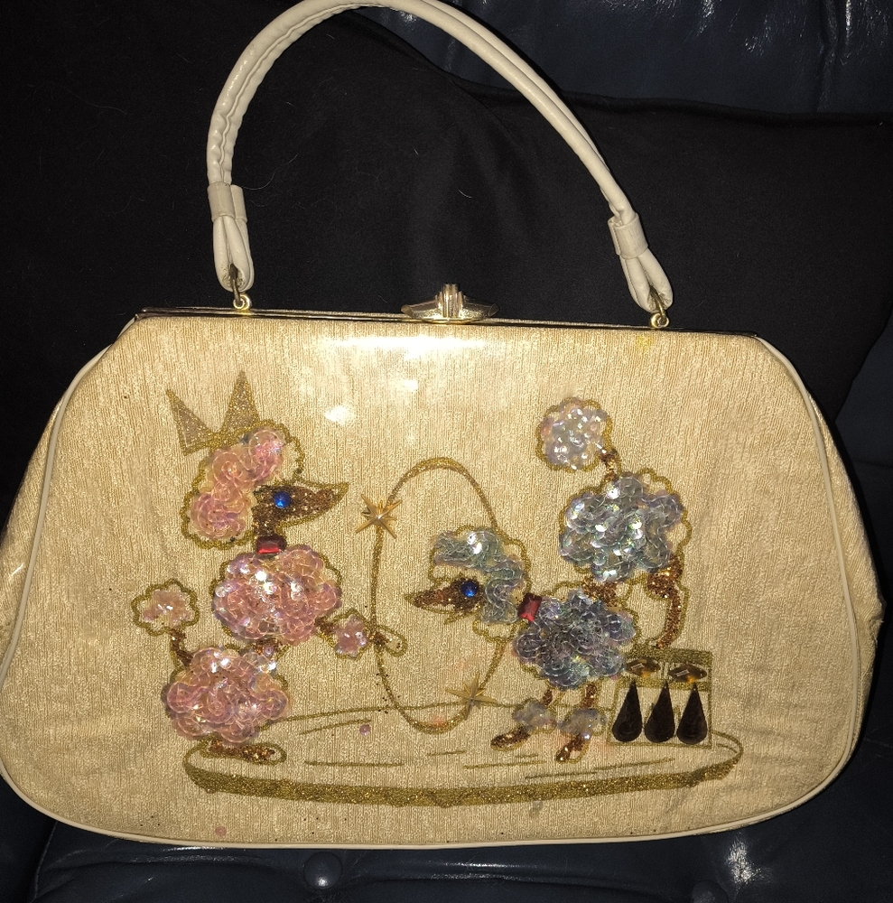 Elegant Cream Handbag with Embroidered Sequins Of a Pink And Baby Blue Design